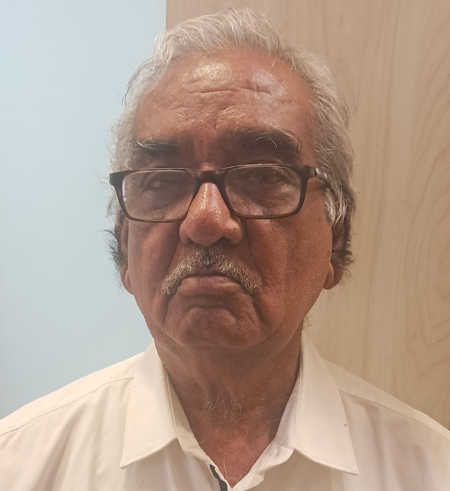 Dr. Mansukh Achalia
